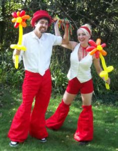 A colourful duo of balloon modellers